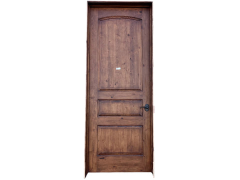 Reclaimed interior door, solid wood, with jamb, hinges and knob. 36" wide, 95" tall, 6.5" deep. Left opening. 