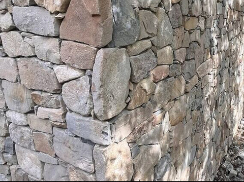 Installed full bed building stone, perfect for exterior & interior facades. 