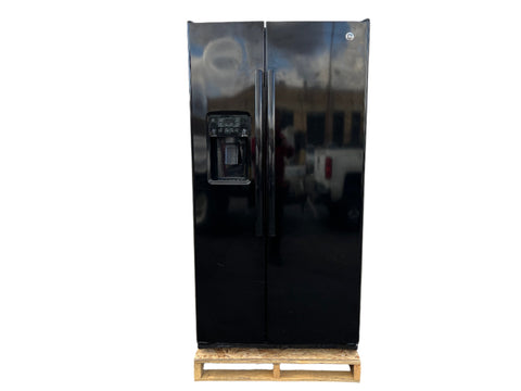 Reclaimed General Electric side-by-side refrigerator with black finish. 