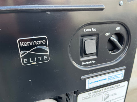 Detail of controls on Kenmore 665.14739111 trash compactor. 