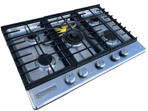 Overview of reclaimed 30" KitchenAid gas cooktop with 5 burners, electronic ignition, auto reignition and removable, washable cast iron grates. 