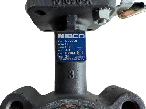 Label detail on reclaimed 3" Nibco butterfly valve, part # NLQ100F. 