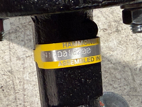 Detail of label on good, used Hammond 3" butterfly valve for potable water systems. 