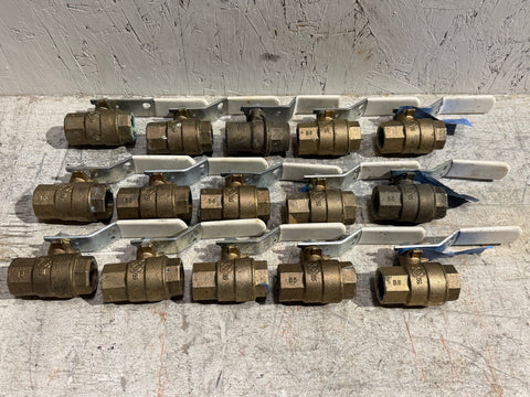 Multiple 3/4", threaded end, bronze ball valves by Nibco. 