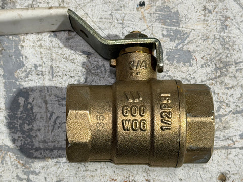 Detail of markings on reclaimed 3/4" brass water valve. 