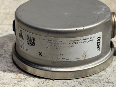 Label detail on good, used, Weksler, glycerin filled pressure gauge. 