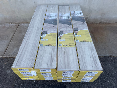 Lot of 20 boxes of TrafficMaster laminate flooring; 480 total sq. ft. coverage. 