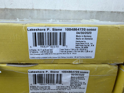 Label detail of new 7mm x 7.64" x 50.63" flooring with 9 planks & 24.17 sq. ft. per box. 