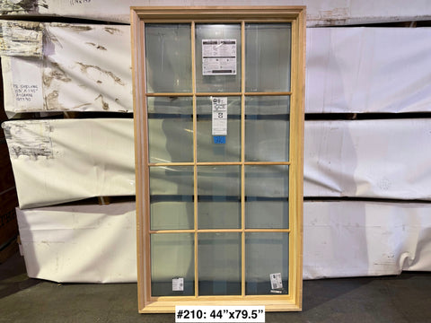 Fixed casement-style wood-frame window with grid by Pella, sized 44"x79.5". 