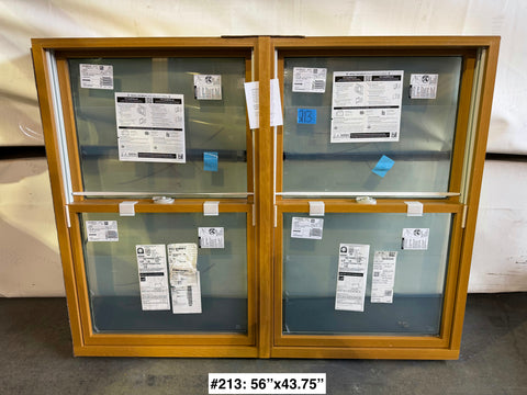Twin dual hung window with wood & aluminum frame by Pella. 56"Wx43.75"H. 