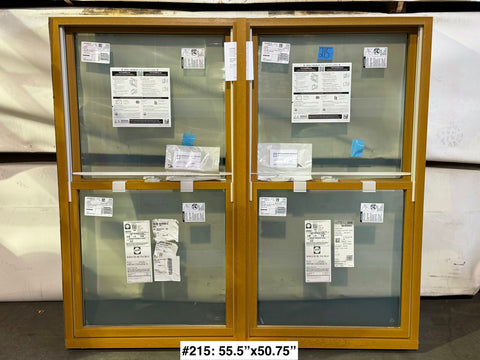 Dual DH wood & metal frame 2-pane window by Pella measuring 55.5"x50.75". 