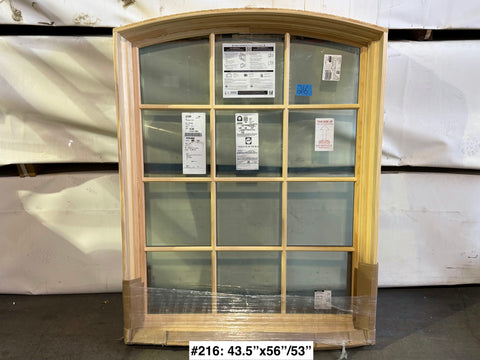 Fixed, 2-pane Pella window with wood frame & arch top. 43.5"x56"/53". 