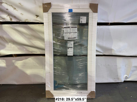 Fixed, vinyl frame, dual pane window by Pella, sized 29.5"x59.5", with trim fin. 