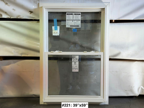 39"Wx59"H new Pella dual hung window with vinyl frame & trim fin. 