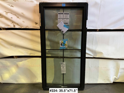Nearly new Pella fiberglass-framed window with grid, LH opening and nail fin, sized 35.5x71.5. 