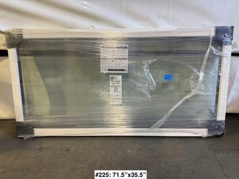 New casement-style fixed window by Pella with vinyl frame measuring 71.5x35.5. 
