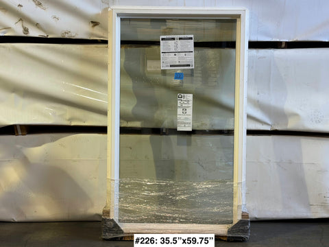 New Pella two pane fixed window with vinyl frame with nail fin, sized 35.5x59.75. 