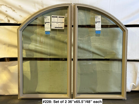 New set of two arched windows with beige frames & fixed glass by Pella. 