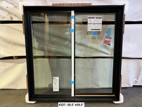 New single slider Pella window with black painted wood interior & black fiberglass exterior. 