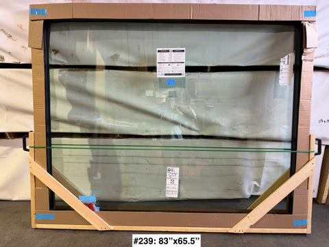 New fixed 2 pane black fiberglass framed Pella window with nail fin. 