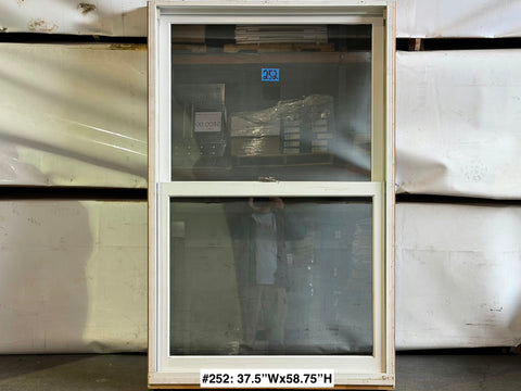 Used Marvin wood-framed double hung window. 