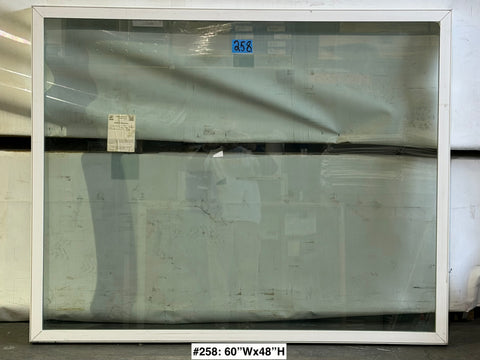 New, fixed, white vinyl-framed Amsco window. 