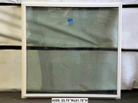 New, white vinyl-framed, fixed Amsco window with trim fin. 