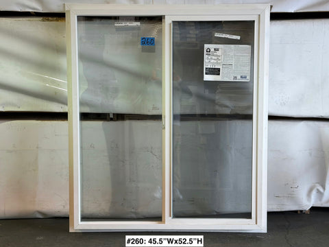 New Amsco single sliding window with white vinyl frame & trim fin. 