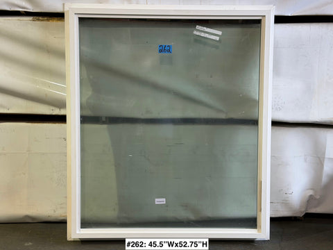 New Amsco window with fixed glass, white vinyl frame & trim fin. 