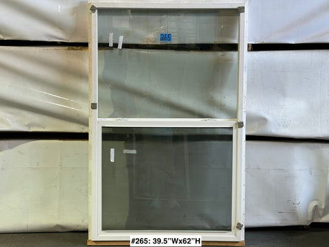New, single hung, white vinyl-framed Amsco window with nail fin. 
