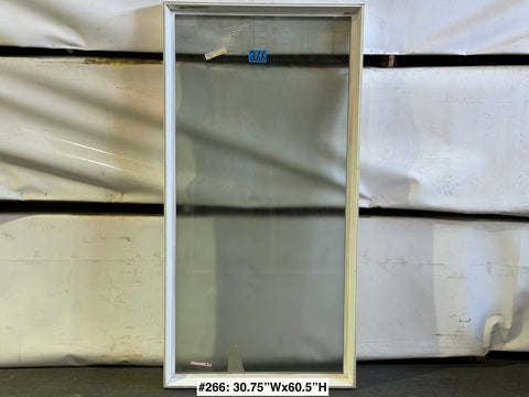 New, fixed Amsco window with white vinyl frame. 
