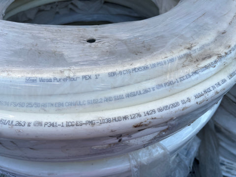 Detail of printed specifications on 1" Viega PEX pipe. 