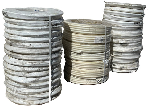 Several 100' coils of 3/4" and 1" PEX plumbing pipe for hot or cold potable water. 