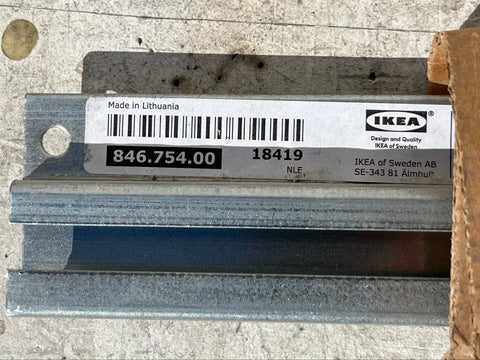 Metal wall mounting bracket with IKEA label. 