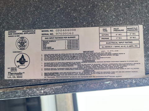 Label on Thermador gas cooking appliance with technical specifications. 