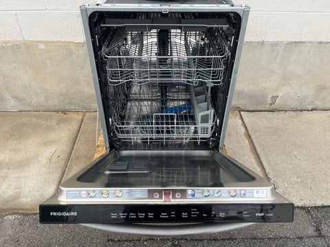 Overview of interior of good used Frigidaire built-in dishwasher with stainless steel tub. 