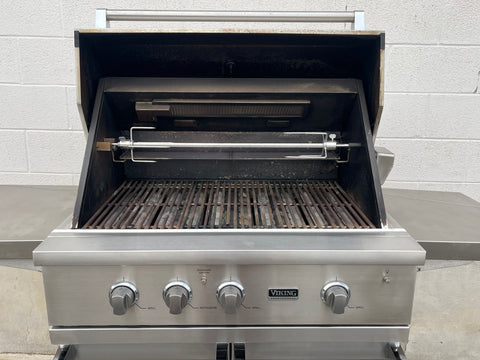 36" Viking grill interior with stainless steel grates & rotisserie. 
