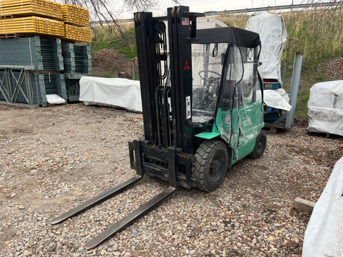 Front of 4,000 pound capacity Mitsubishi FG20 forklift. 