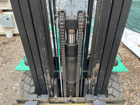 Detail of main lifting ram on mast of Mitsubishi FG20 fork truck. 