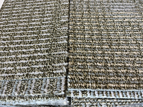 Detail of good, used, 3/8" thick, 20" commercial carpet in blue, gray, tan & green pattern. 