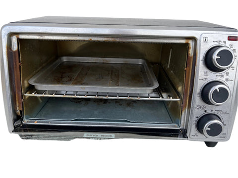 Front view with door open of Black and Decker model TO1303SB toaster oven showing interior. 