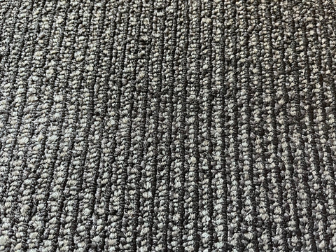 18"x36", black & dark gray lined, used commercial carpet tiles. 