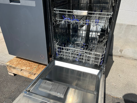 LG LDF7774ST dishwasher with door open displaying stainless steel tub and multiple racks. 