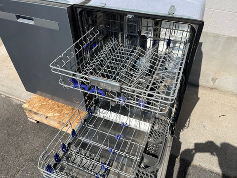 Opened Easy Rack Plus racks inside used LG LDF7774ST 24" dishwasher. 