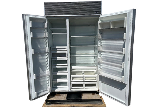 Interior of good, used Sub-Zero, 48", built-in refrigerator/freezer, model # 532. Features adjustable shelves, bins and drawers. 