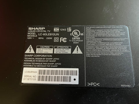 Close up of label on back of Sharp AQUOS #LC-60LE810UN 60" smart HDTV. 