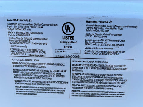 Close up of label on rear of reclaimed Hamilton Beach #HB-P100N30AL-S3 household microwave oven. 