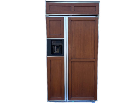 Front view of G.E. Monogram 42" built-in refrigerator, model #ZISB42DCA showing custom cabinet fascia and ice/water dispenser. 