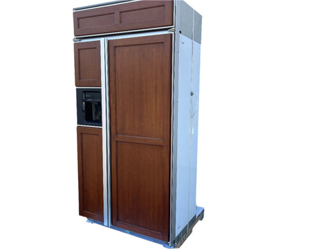 3/4 right view of General Electric Monogram 42" built-in SxS fridge with custom wood front. 