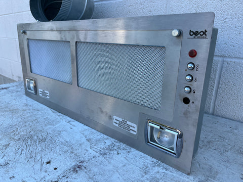 3/4 view of BEST under cabinet range hood made of stainless steel. 